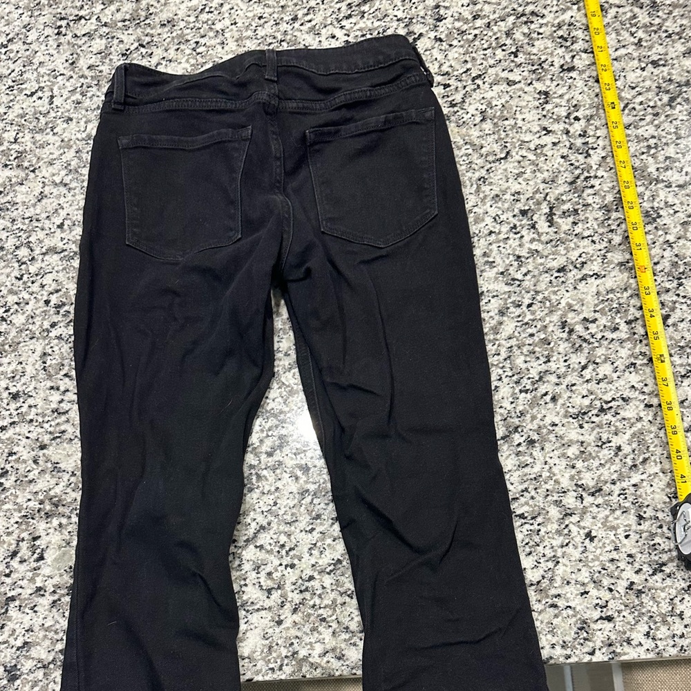 Womens size 4 Mid Rise Boot Cut Old Navy jeans good condition.